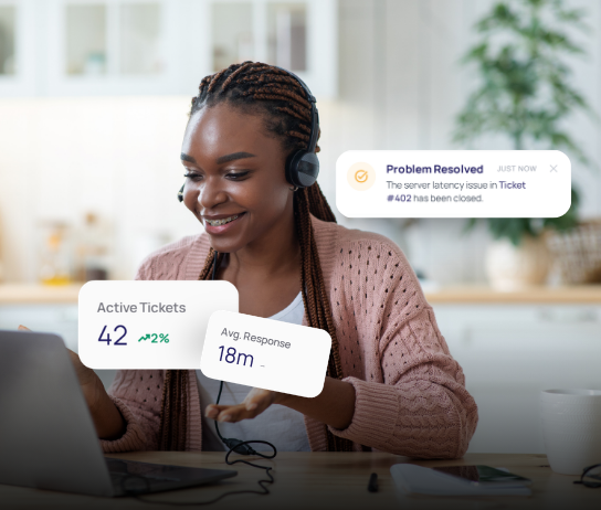 Support specialist with headset at laptop beside ticket metrics and resolved incident toast